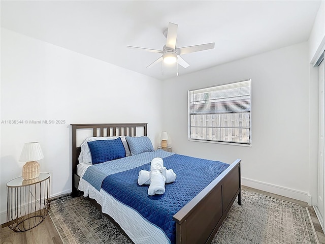 1309 SW 75th Ave, North Lauderdale, FL 33068 - bedroom with wood finished floors and a ceiling fan