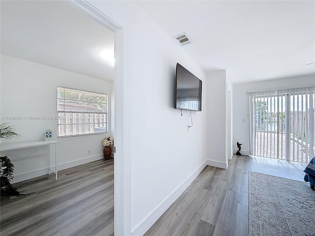 1309 SW 75th Ave, North Lauderdale, FL 33068 - hallway featuring wood finished floors and baseboards