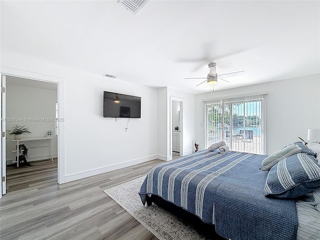 1309 SW 75th Ave, North Lauderdale, FL 33068 - bedroom featuring light wood finished floors, a ceiling fan, and access to outside