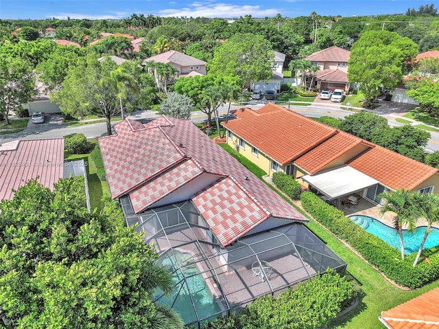 aerial view of residential area featuring a pool area