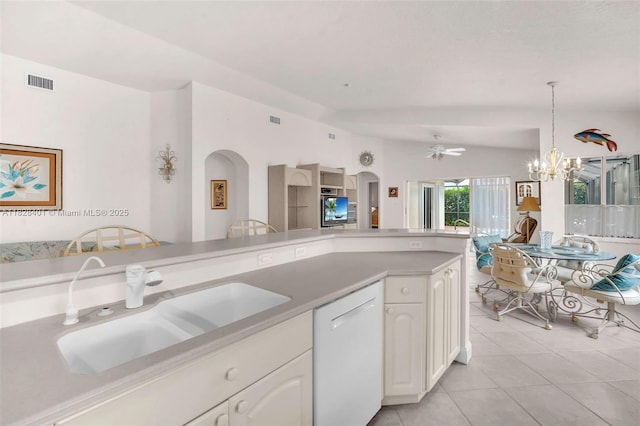 kitchen with dishwasher, light tile patterned floors, white cabinetry, a chandelier, and open floor plan