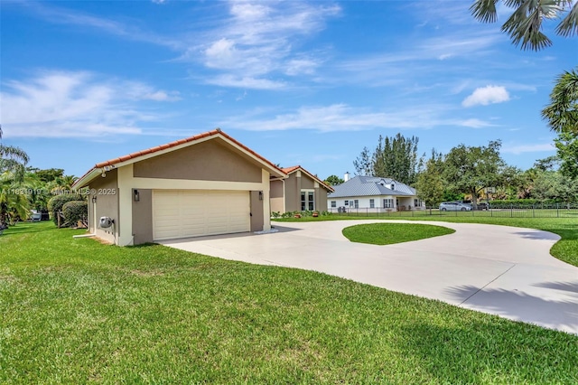 14100 SW 21st St, Davie, FL 33325 - ranch-style home with curved driveway, stucco siding, a garage, and a tiled roof
