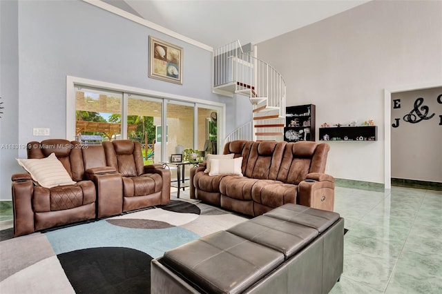 14100 SW 21st St, Davie, FL 33325 - living area featuring a high ceiling, stairs, and crown molding