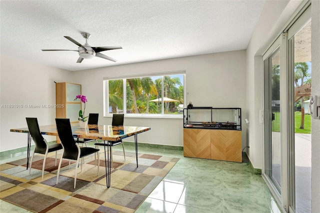 14100 SW 21st St, Davie, FL 33325 - dining space with a textured ceiling and ceiling fan