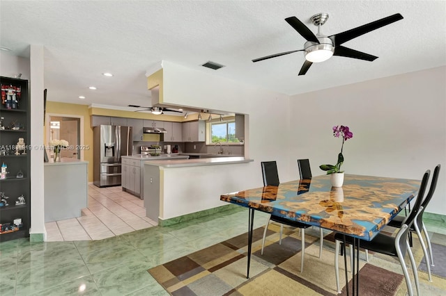 14100 SW 21st St, Davie, FL 33325 - dining space featuring ceiling fan, a textured ceiling, and recessed lighting