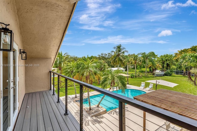 14100 SW 21st St, Davie, FL 33325 - balcony with view of pool and view of wooded area