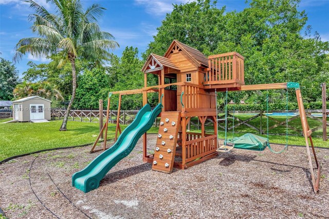 14100 SW 21st St, Davie, FL 33325 - view of playground featuring an outbuilding and view of scattered trees