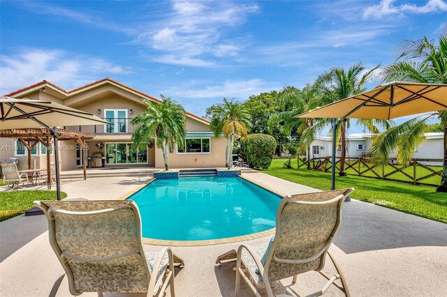 14100 SW 21st St, Davie, FL 33325 - swimming pool featuring a patio