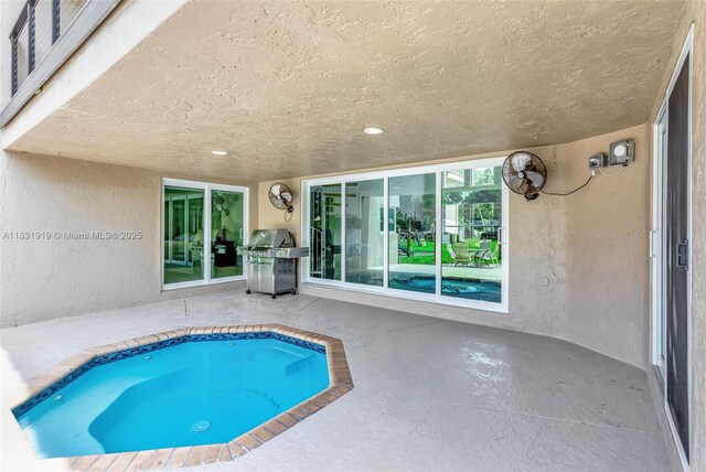 14100 SW 21st St, Davie, FL 33325 - view of swimming pool featuring area for grilling and a patio