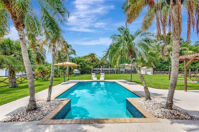 14100 SW 21st St, Davie, FL 33325 - outdoor pool with a storage unit and a patio area