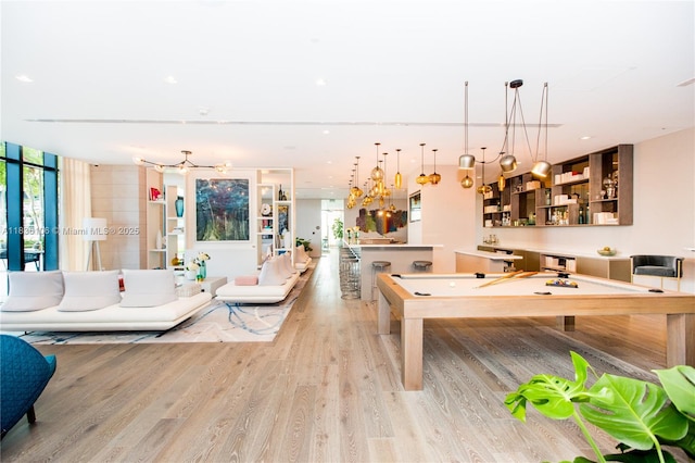 650 NE 32nd St Unit 2205, Miami, FL 33137 - game room with light wood-type flooring and a chandelier