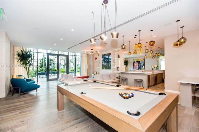 650 NE 32nd St Unit 2205, Miami, FL 33137 - game room featuring a wall of windows, a chandelier, pool table, light wood-style floors, and recessed lighting