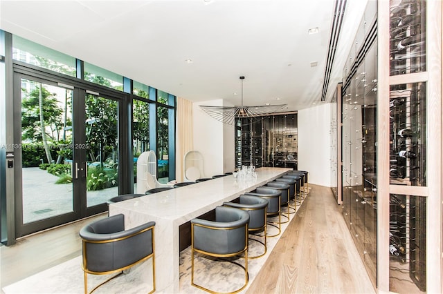 650 NE 32nd St Unit 2205, Miami, FL 33137 - wine area with light wood finished floors, plenty of natural light, and expansive windows