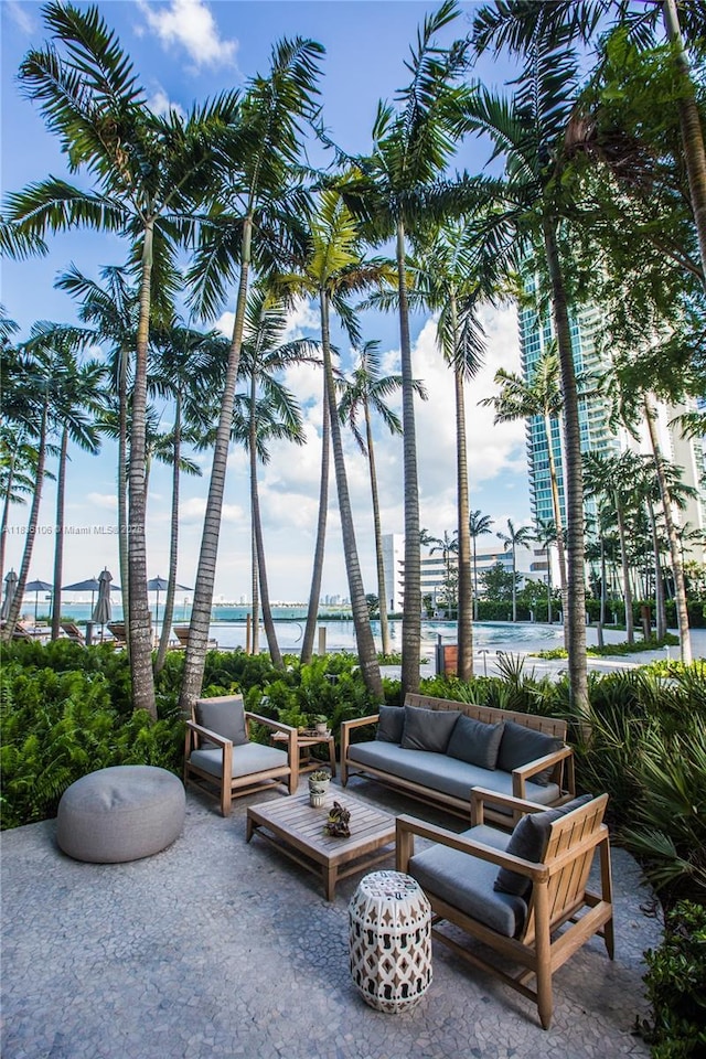 650 NE 32nd St Unit 2205, Miami, FL 33137 - view of patio featuring outdoor lounge area and a water view