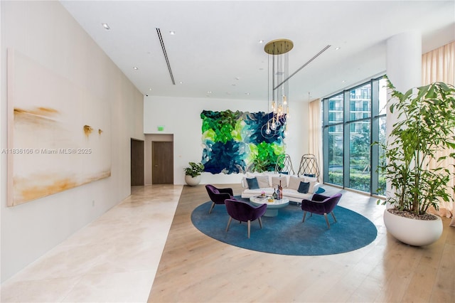 650 NE 32nd St Unit 2205, Miami, FL 33137 - living area with a high ceiling and wood finished floors