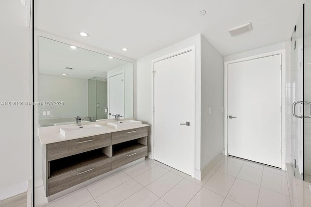 650 NE 32nd St Unit 2205, Miami, FL 33137 - full bath featuring double vanity, a stall shower, recessed lighting, and tile patterned flooring