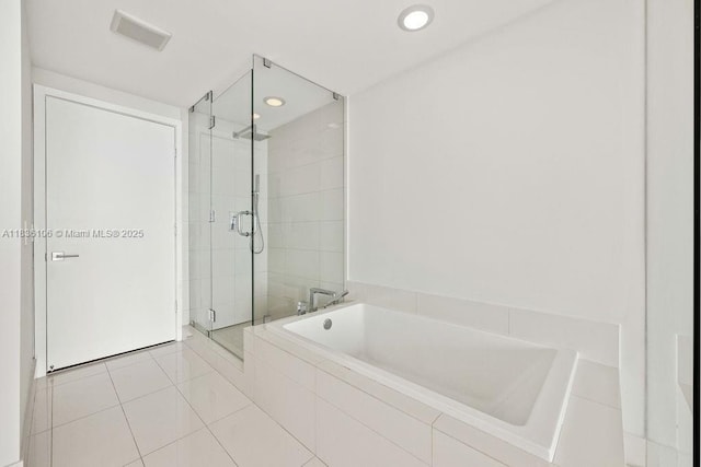 650 NE 32nd St Unit 2205, Miami, FL 33137 - bathroom with a stall shower, a bath, tile patterned floors, and recessed lighting