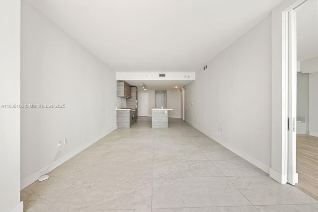 650 NE 32nd St Unit 2205, Miami, FL 33137 - unfurnished living room with baseboards