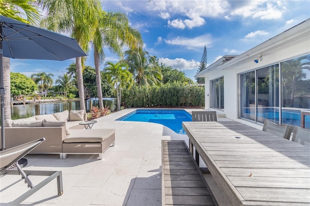 117 Almar Dr, Wilton Manors, FL 33334 - view of pool with a patio area, an outdoor living space, and a water view