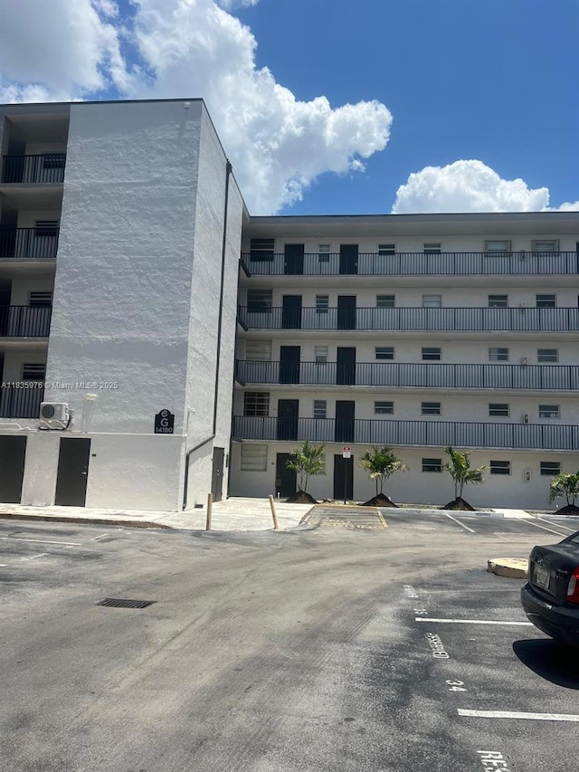 14180 SW 84th St Unit 407-G, Miami, FL 33183 - view of apartment building / complex with uncovered parking