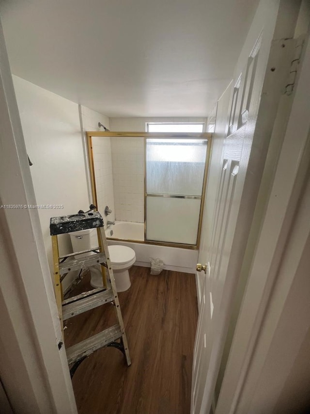 14180 SW 84th St Unit 407-G, Miami, FL 33183 - bathroom with shower / bath combination with glass door and wood finished floors