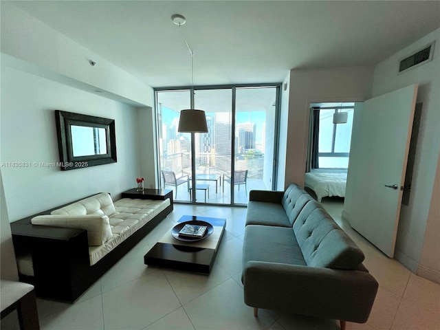 350 S Miami Ave Unit 2303, Miami, FL 33130 - living area featuring light tile patterned floors and expansive windows