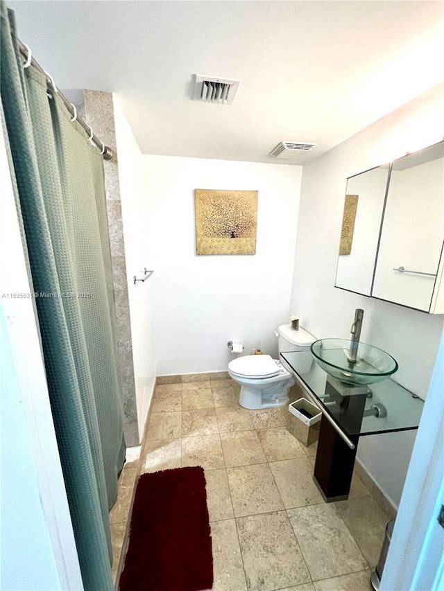 350 S Miami Ave Unit 2303, Miami, FL 33130 - full bathroom featuring toilet and a shower stall