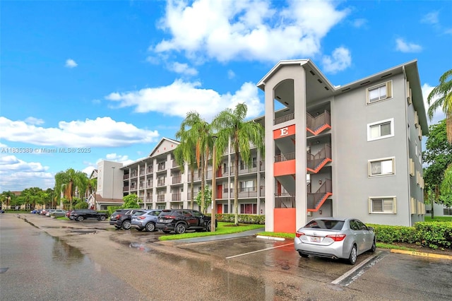 801 SW 138th Ave Unit 103E, Pembroke Pines, FL 33027 - view of apartment building / complex with uncovered parking
