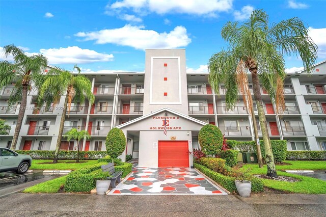 801 SW 138th Ave Unit 103E, Pembroke Pines, FL 33027 - view of apartment building / complex with uncovered parking