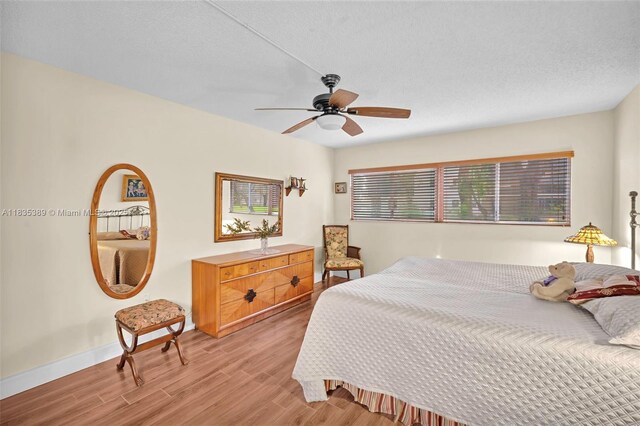 801 SW 138th Ave Unit 103E, Pembroke Pines, FL 33027 - bedroom featuring light wood-type flooring and ceiling fan