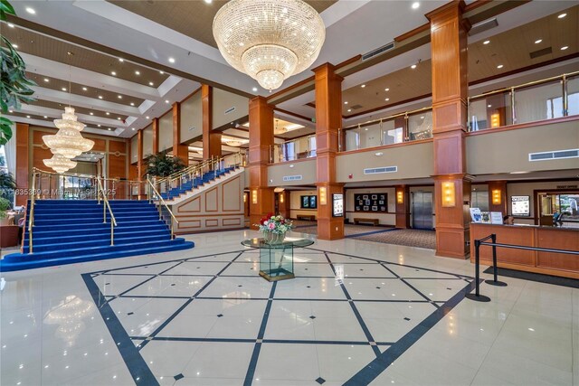 801 SW 138th Ave Unit 103E, Pembroke Pines, FL 33027 - common area featuring a towering ceiling, recessed lighting, and stairway