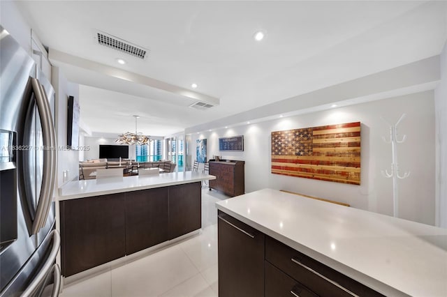 100 Bayview Dr Unit 1905, Sunny Isles Beach, FL 33160 - kitchen featuring stainless steel refrigerator with ice dispenser, light countertops, open floor plan, modern cabinets, and recessed lighting