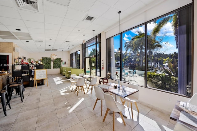 100 Bayview Dr Unit 1905, Sunny Isles Beach, FL 33160 - dining area featuring a paneled ceiling and tile patterned flooring