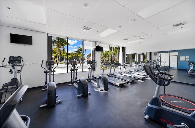 100 Bayview Dr Unit 1905, Sunny Isles Beach, FL 33160 - gym featuring a drop ceiling and floor to ceiling windows