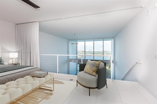 1040 Biscayne Blvd Unit 2402, Miami, FL 33132 - bedroom featuring tile patterned flooring, access to outside, and floor to ceiling windows