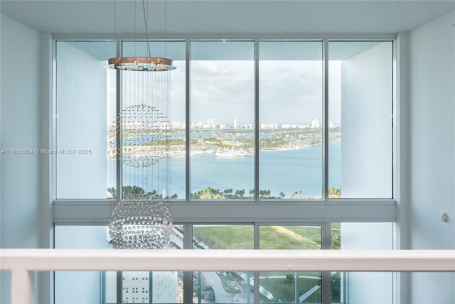 1040 Biscayne Blvd Unit 2402, Miami, FL 33132 - detailed view of a chandelier, a city view, and nearby water