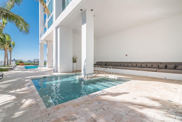 1040 Biscayne Blvd Unit 2402, Miami, FL 33132 - community pool featuring a patio