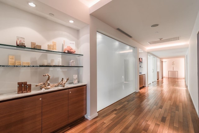 1040 Biscayne Blvd Unit 2402, Miami, FL 33132 - hallway with hardwood / wood-style floors and recessed lighting