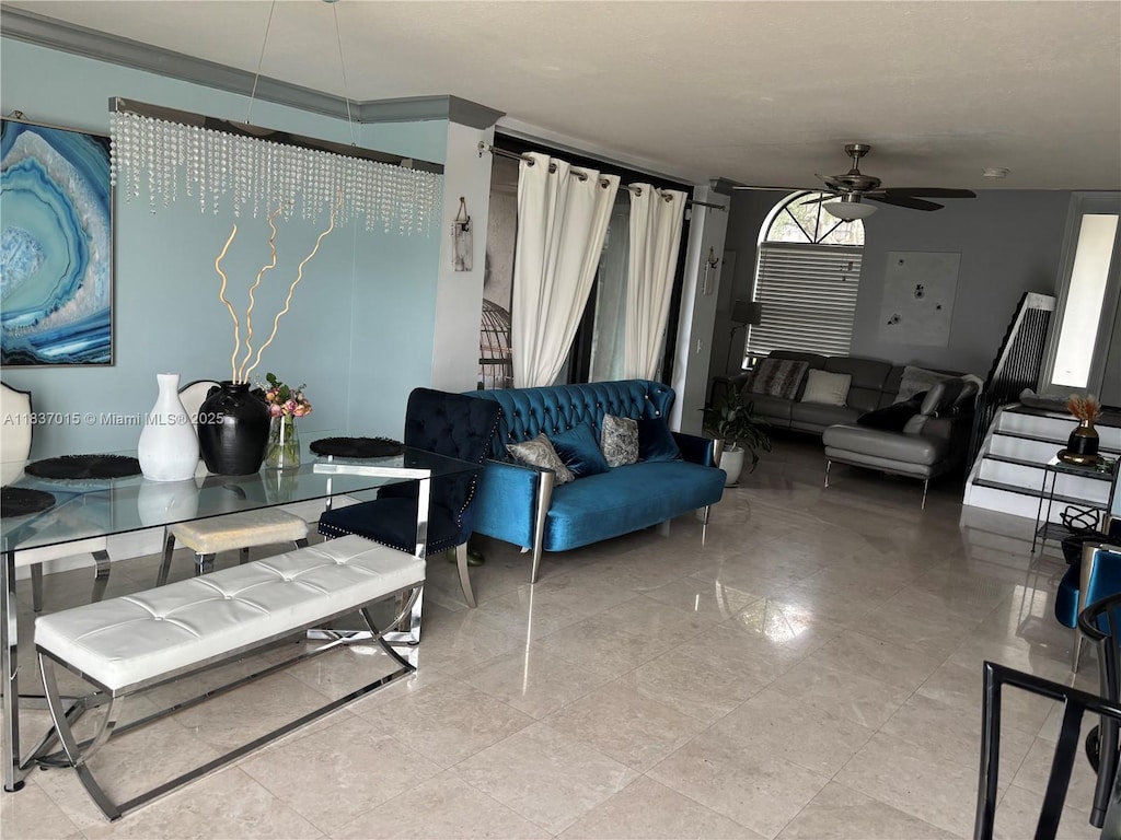 living room featuring a ceiling fan