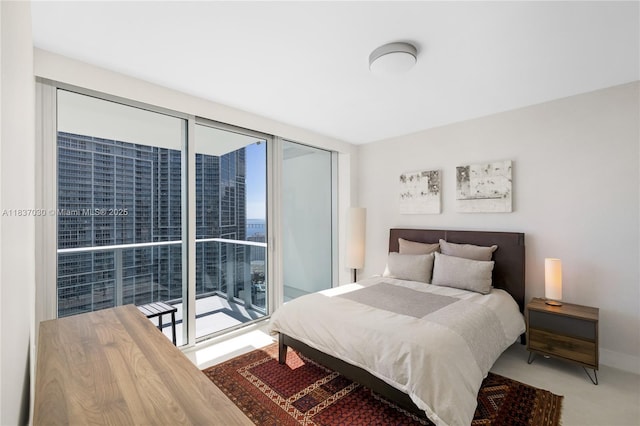 200 Biscayne Boulevard Way Unit 3207, Miami, FL 33131 - bedroom with multiple windows and access to outside