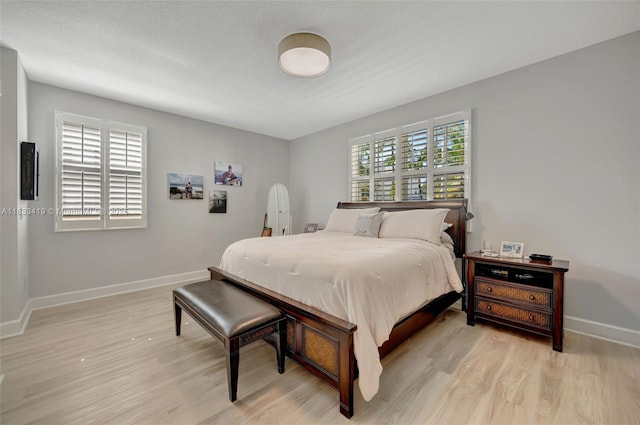 7588 SW 102nd St Unit 203, Pinecrest, FL 33156 - bedroom featuring light wood-style flooring