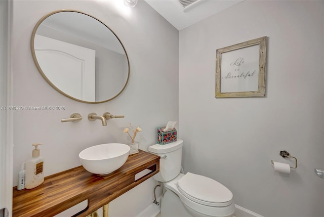 7588 SW 102nd St Unit 203, Pinecrest, FL 33156 - half bathroom with a sink and toilet