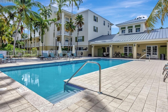 7588 SW 102nd St Unit 203, Pinecrest, FL 33156 - community pool featuring a patio