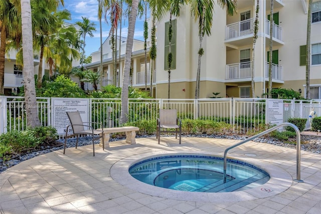 7588 SW 102nd St Unit 203, Pinecrest, FL 33156 - view of swimming pool featuring a community hot tub