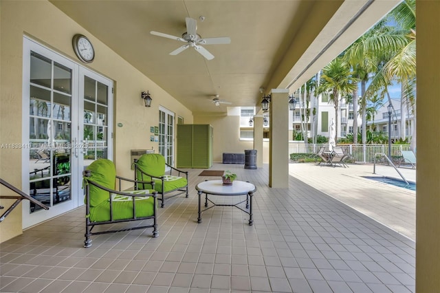 7588 SW 102nd St Unit 203, Pinecrest, FL 33156 - view of patio featuring ceiling fan and french doors