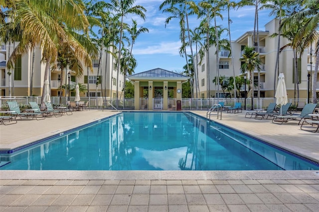 7588 SW 102nd St Unit 203, Pinecrest, FL 33156 - community pool featuring a patio