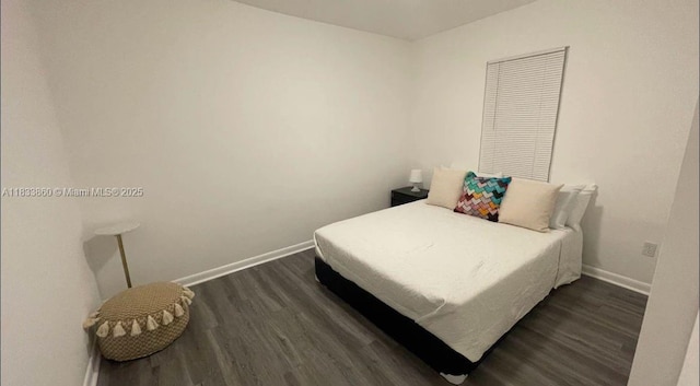 2993 SW 16th Ter, Miami, FL 33145 - bedroom featuring dark wood finished floors and baseboards