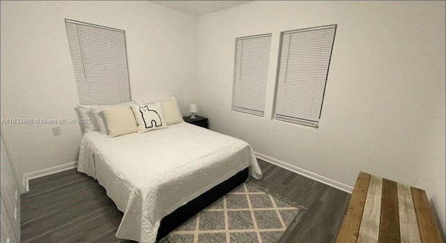 2993 SW 16th Ter, Miami, FL 33145 - bedroom with baseboards and dark wood finished floors
