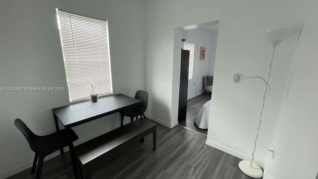 2993 SW 16th Ter, Miami, FL 33145 - dining space featuring baseboards and dark wood-type flooring