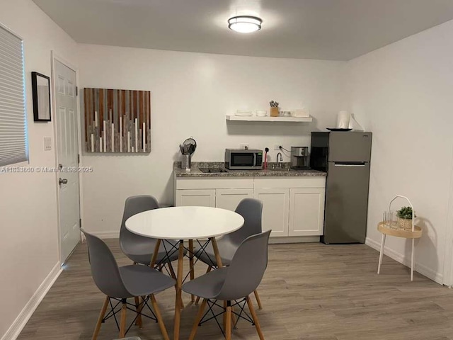 2993 SW 16th Ter, Miami, FL 33145 - dining space with wood finished floors and baseboards